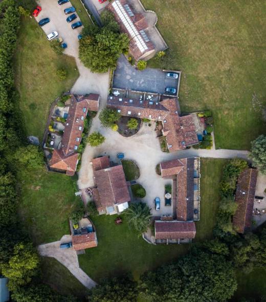 An aerial shot of cottages in Devon, UK